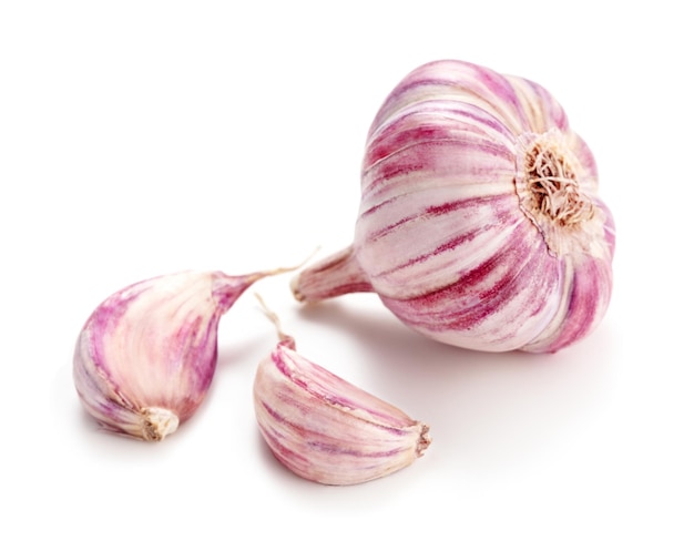 Raw garlic on white background