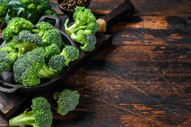 Raw green broccoli cabbage in a colander.