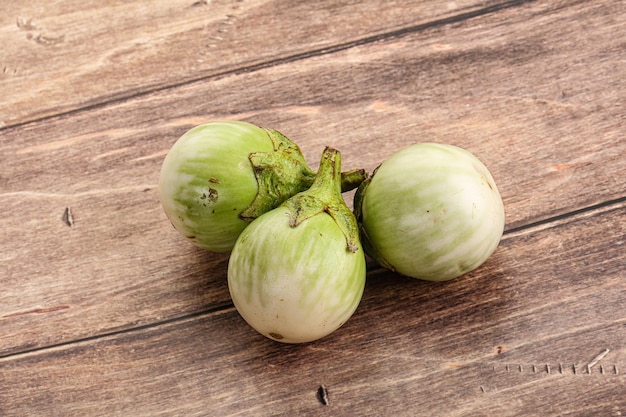 Raw green round eggplant vegetable heap