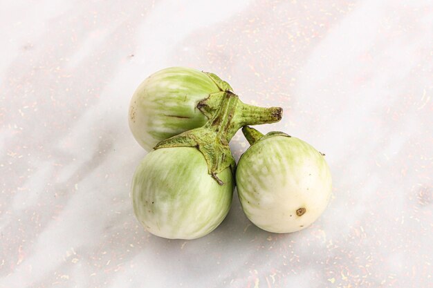 Raw green round eggplant vegetable heap