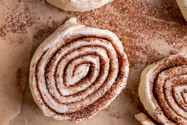 Raw homemade cinnamon buns ready to be baked