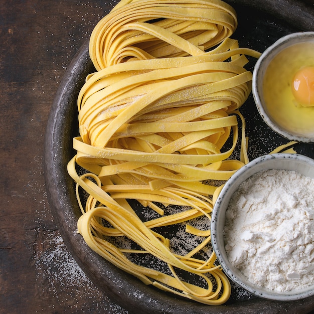 Raw homemade pasta tagliatelle