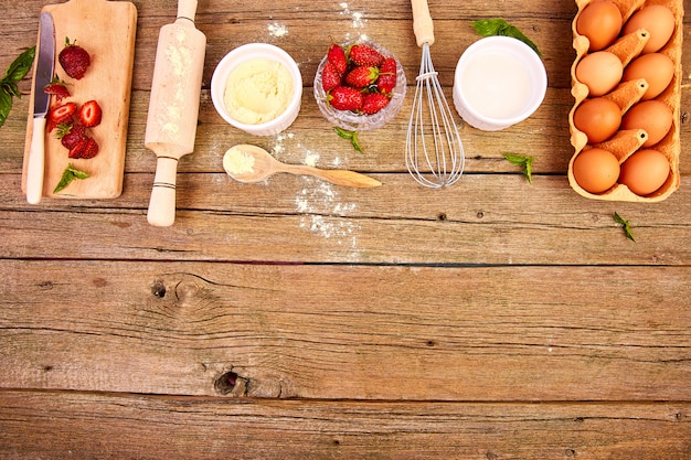 Photo raw ingredients for cooking strawberry pie or cake