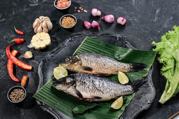 Raw Ingredients of Pesmol Ikan Mas Gold Fish with Yellow Curry Spices