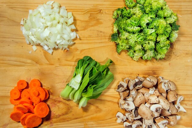 Photo raw ingredients ready to be cooked recipe for chicken stew european cuisine cooked with a garnish of mushrooms small onions and other