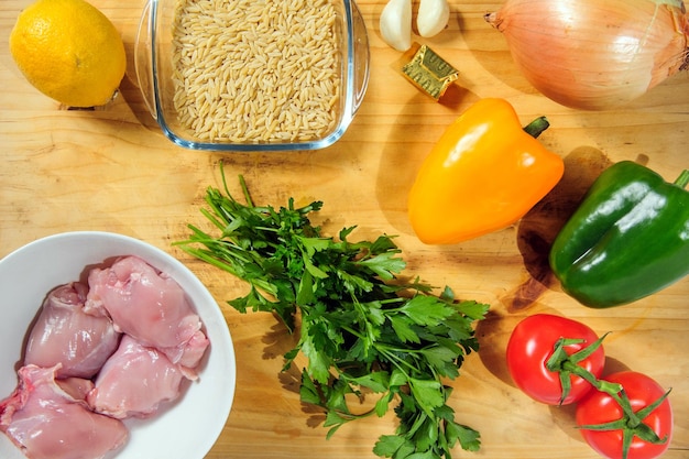 Raw ingredients Ready to be cooked Recipe for chiken stew European cuisine cooked with a garnish of mushrooms small onions and ohter