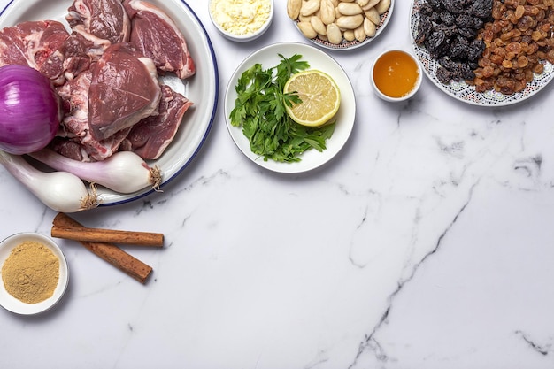 Raw ingredients and spices of traditional lamb stew or tagine