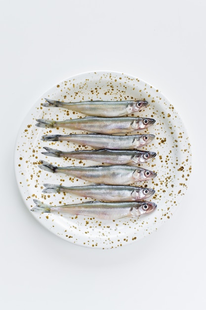 Raw mackerel on a plate. 