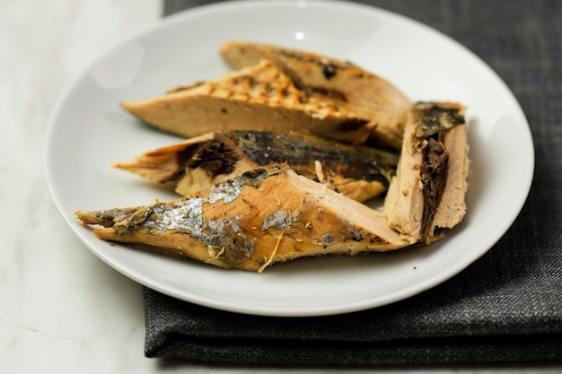 Raw Mackerel Tuna (Pindang Tongkol) on White Plate