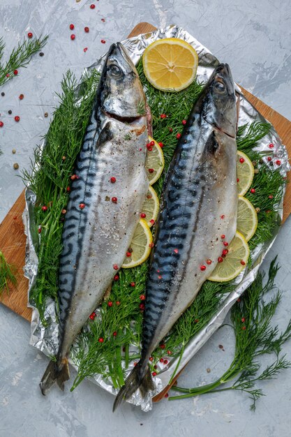 Raw mackerel with lemon and pepper mixture on green dill