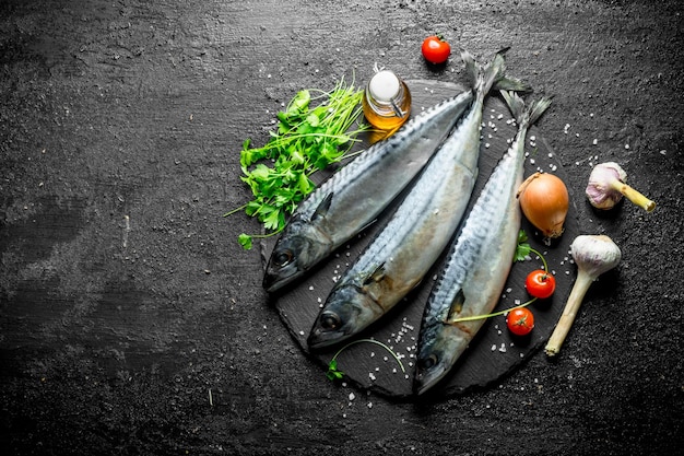 Raw mackerel with onions parsley garlic and tomatoes