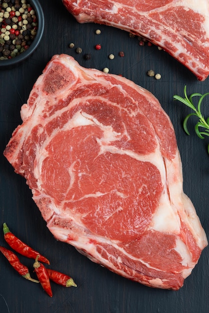 Raw meat beef steak Black angus prime meat set ribeye striploin tbone steaks on cutting board