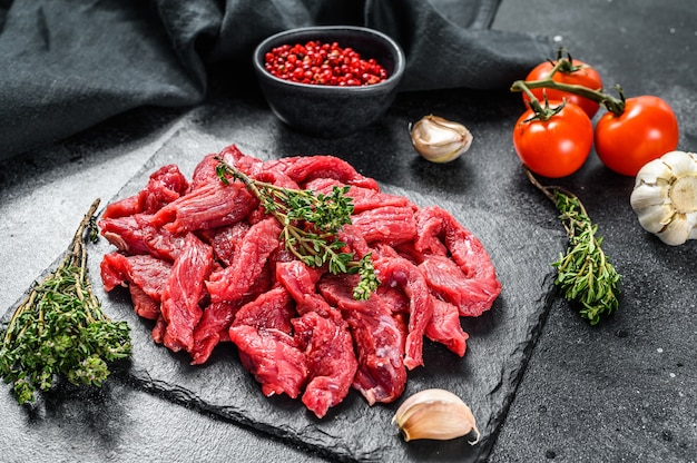 Raw meat cut into thin strips for beef Stroganoff