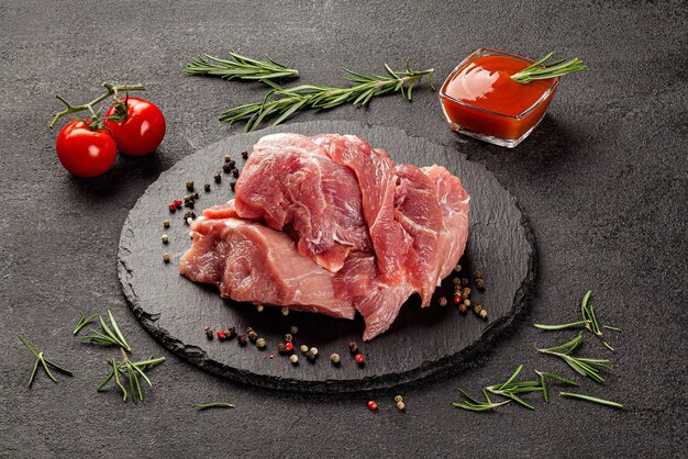 Raw meat on a dark background