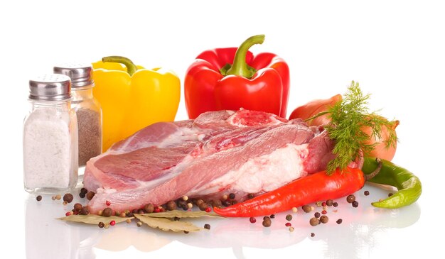 Raw meat and vegetables isolated on white