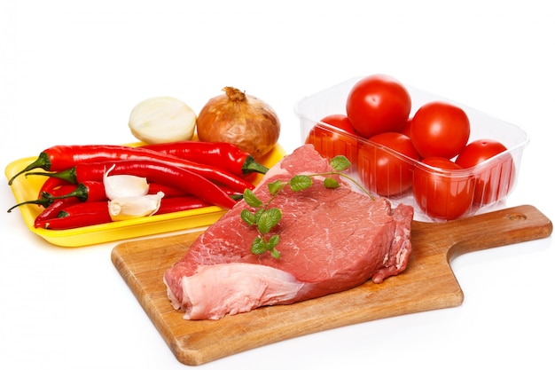 Raw meat and vegetables