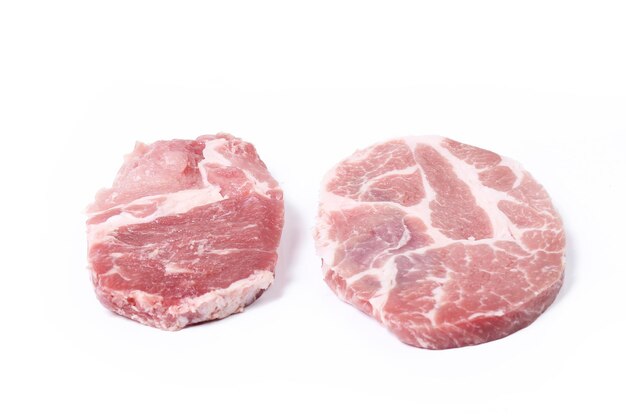 Raw meat on a white background