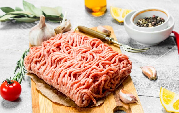 Premium Photo | Raw minced beef with spices and herbs