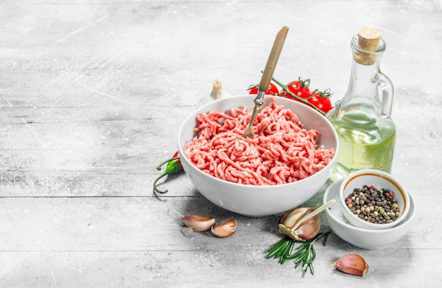 Premium Photo | Raw minced beef with spices and herbs