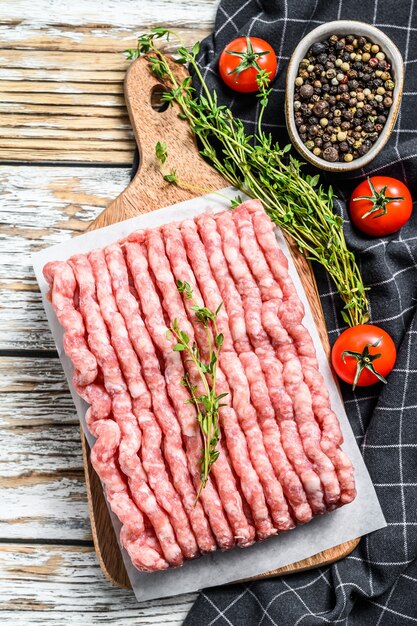 Raw minced pork on a chopping Board