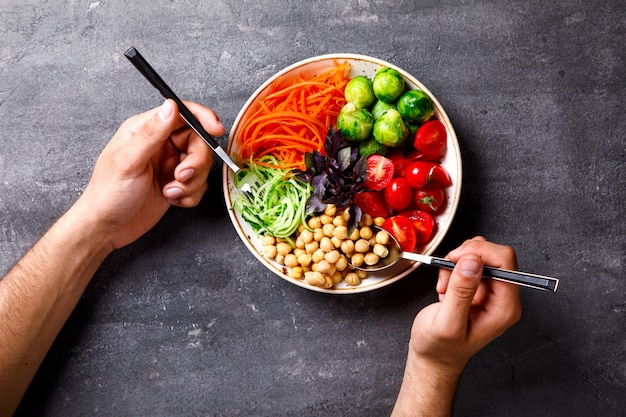 Raw mixed Vegetables and chickpeas. Vegetarian Buddha Bowl.