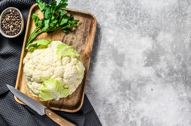 Raw organic cauliflower with leaves