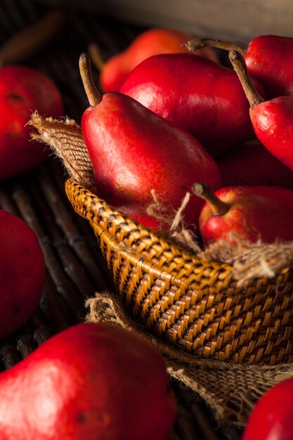 Raw Organic Red Pears in a Basket