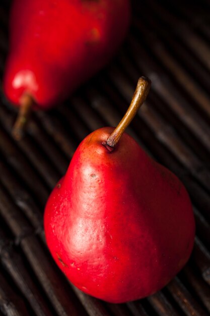 Raw Organic Red Pears in a Basket