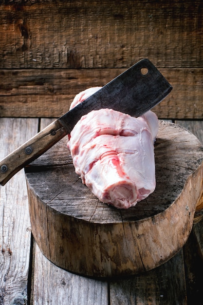 Raw ossobuco on wood