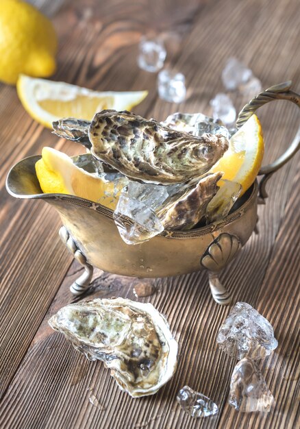 Raw oysters in the gravy boat