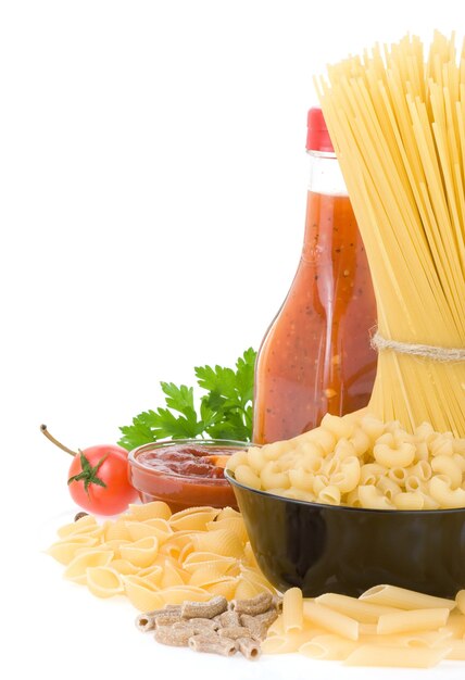 Raw pasta and food ingredient isolated on white