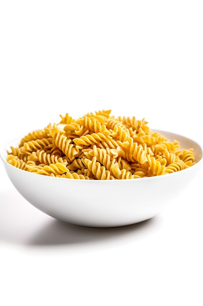 Photo raw pasta fusilli in a bowl on dark wooden background