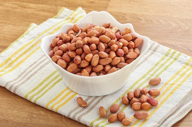 Raw peanut heap in the bowl