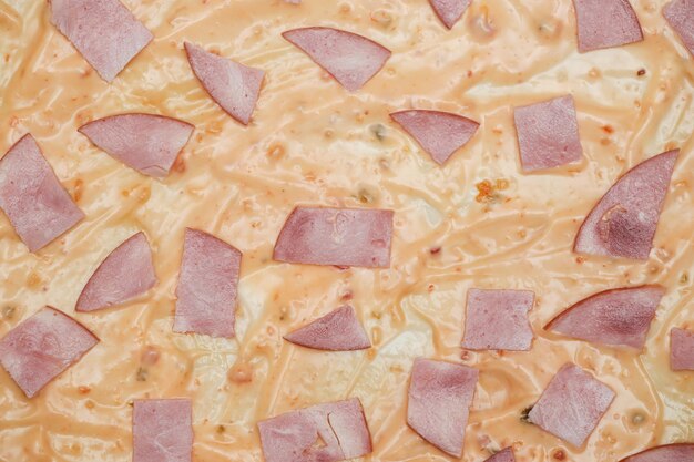 Raw pizza close-up het kookproces