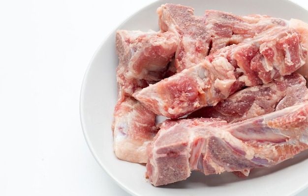 Raw pork bone on white background