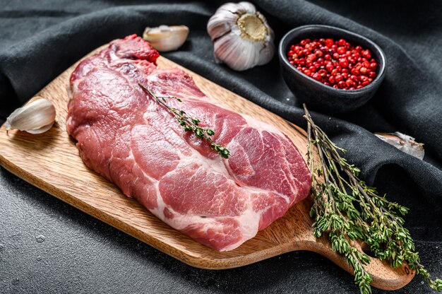 Raw pork cutlet steak