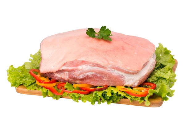 Raw pork meat on cutting board on white background.