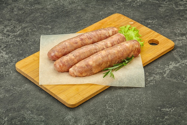 Raw pork meat sausages for grill