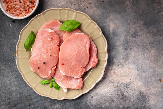 raw pork meat slice cut steak fresh meal food snack on the table copy space food background rustic