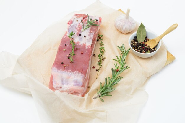 Raw pork meat with herbs