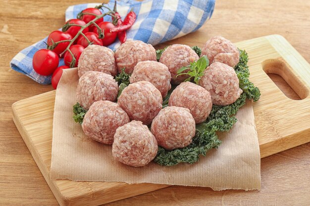 Raw pork meatball for cooking