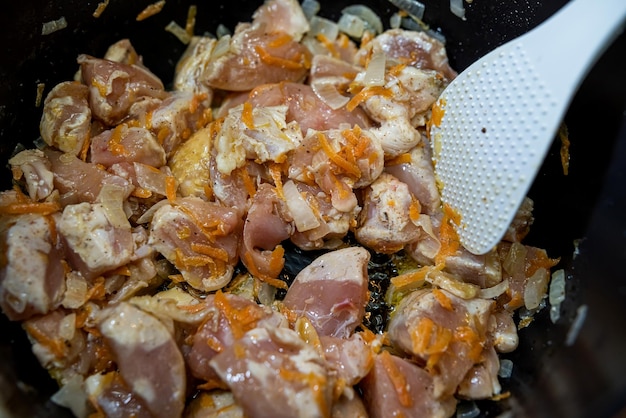 Raw pork pieces marinated in bowl