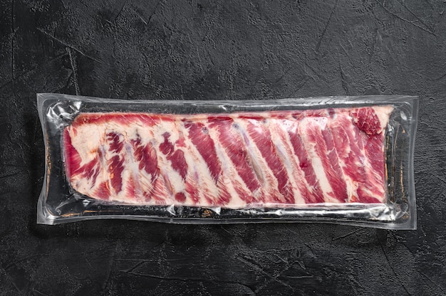 Raw pork ribs vacuum packed. 