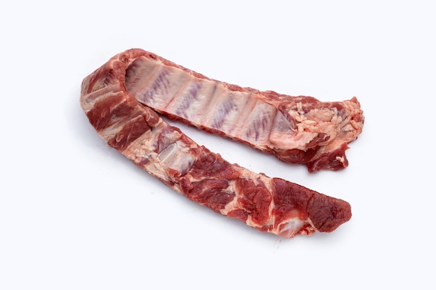 Raw pork ribs on white background.