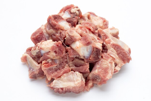 Raw pork ribs on white background.