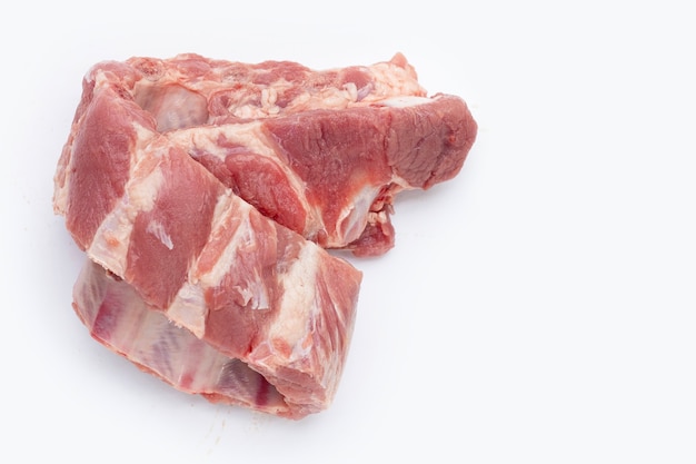 Raw pork ribs on white background.