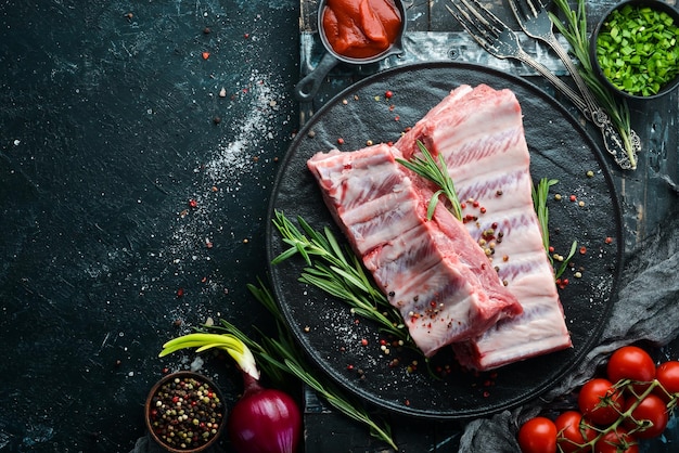 Raw pork ribs with spices Meat Top view Free space for your text