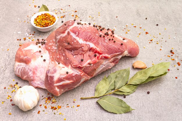 Raw pork shoulder with spices