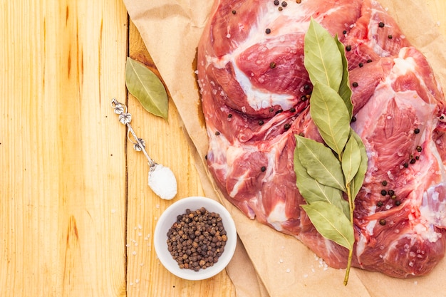 Raw pork shoulder with spices