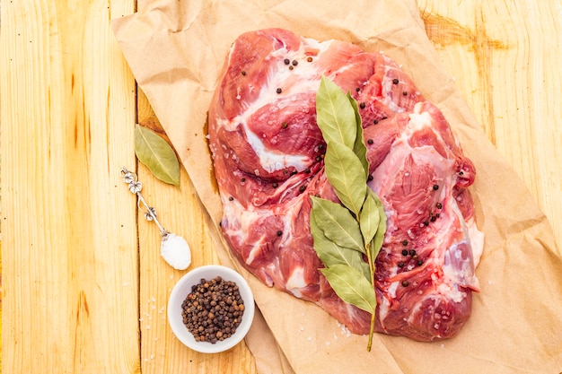 Raw pork shoulder with spices